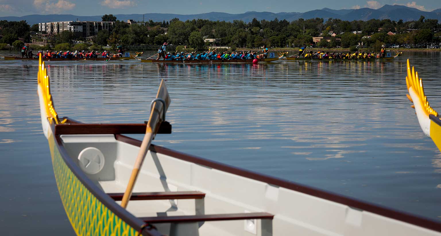 Dragon boat racing practice on a warm spring morning at Lake